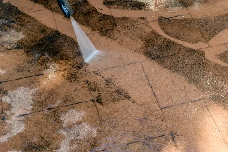 Pressure washing concrete pavers